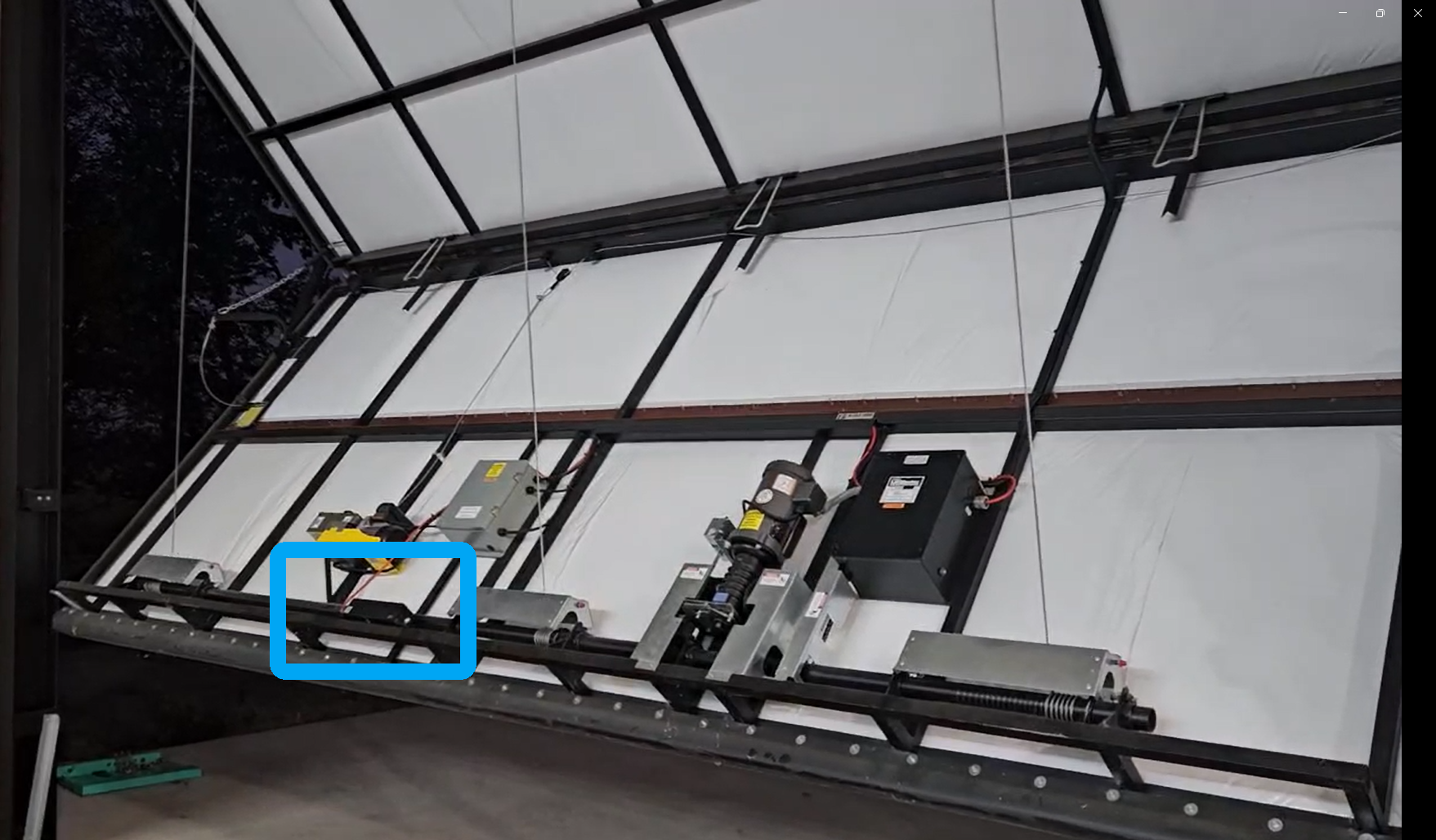 CrashAxis engineering prototype installed on a Hi-Fold bifold door with a LiftMaster controller